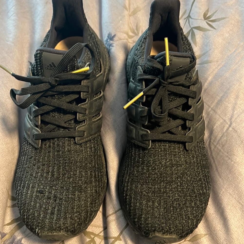 Gently worn pair of Adidas All black Ultraboost shoes.